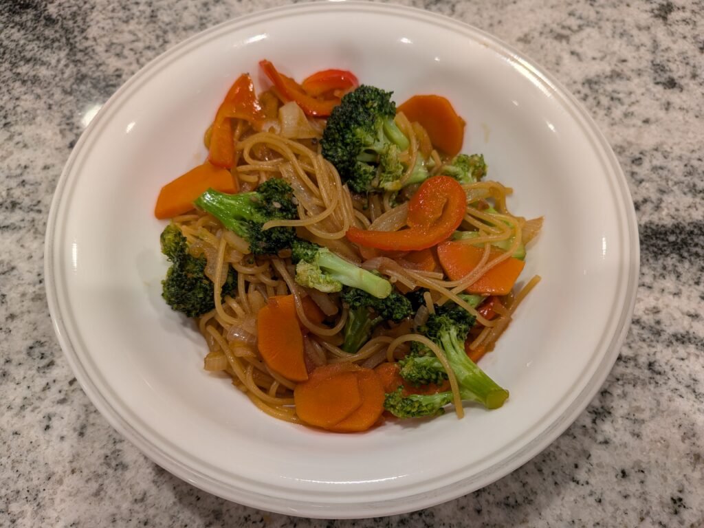 Yummy sautéed vegetables mixed with angel hair pasta, your favorite vegetables and sauce.
