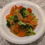 Yummy sautéed vegetables mixed with angel hair pasta, your favorite vegetables and sauce.