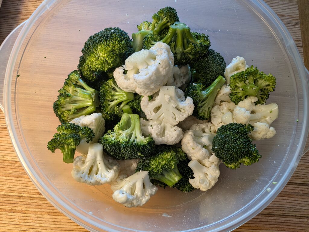 Oven Roasted Veggies broccoli and cauliflower in bowl