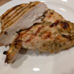 Garlic Herb and Wine flavored chicken on the grill... cooked to perfection. Guaranteed to leave your mouth watering.