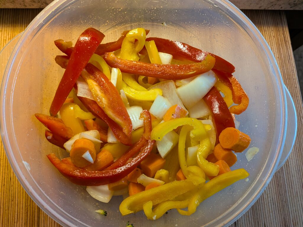 Oven Roasted Veggies onion and bell peppers in bowl