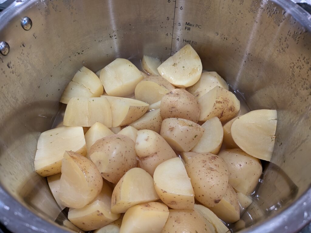 quarted potatoes with water