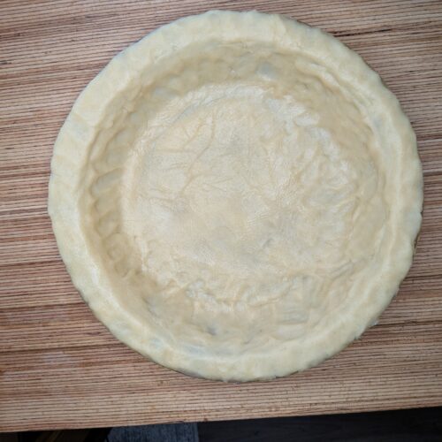 Homemade pie crust ready for filling