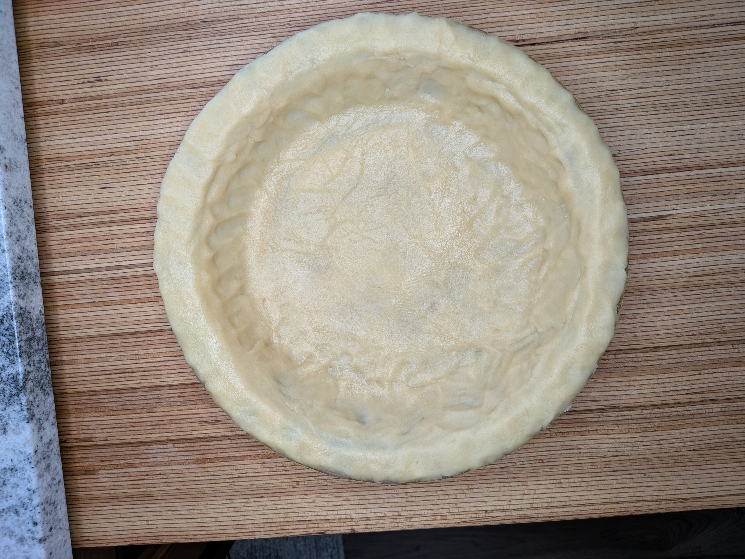 Homemade pie crust ready for filling
