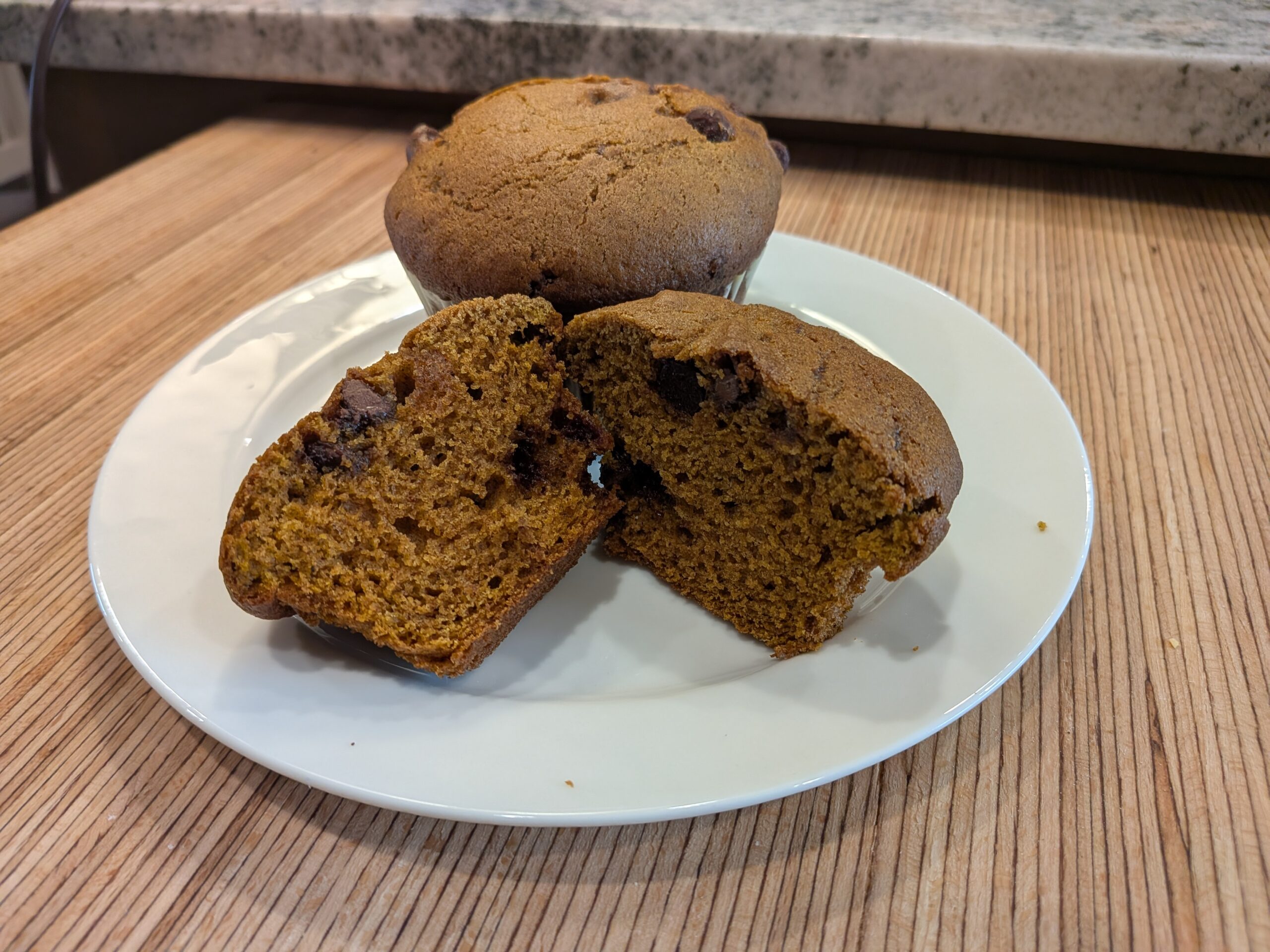 Soft homemade pumpkin chocolate chip muffins filled with chocolate chips